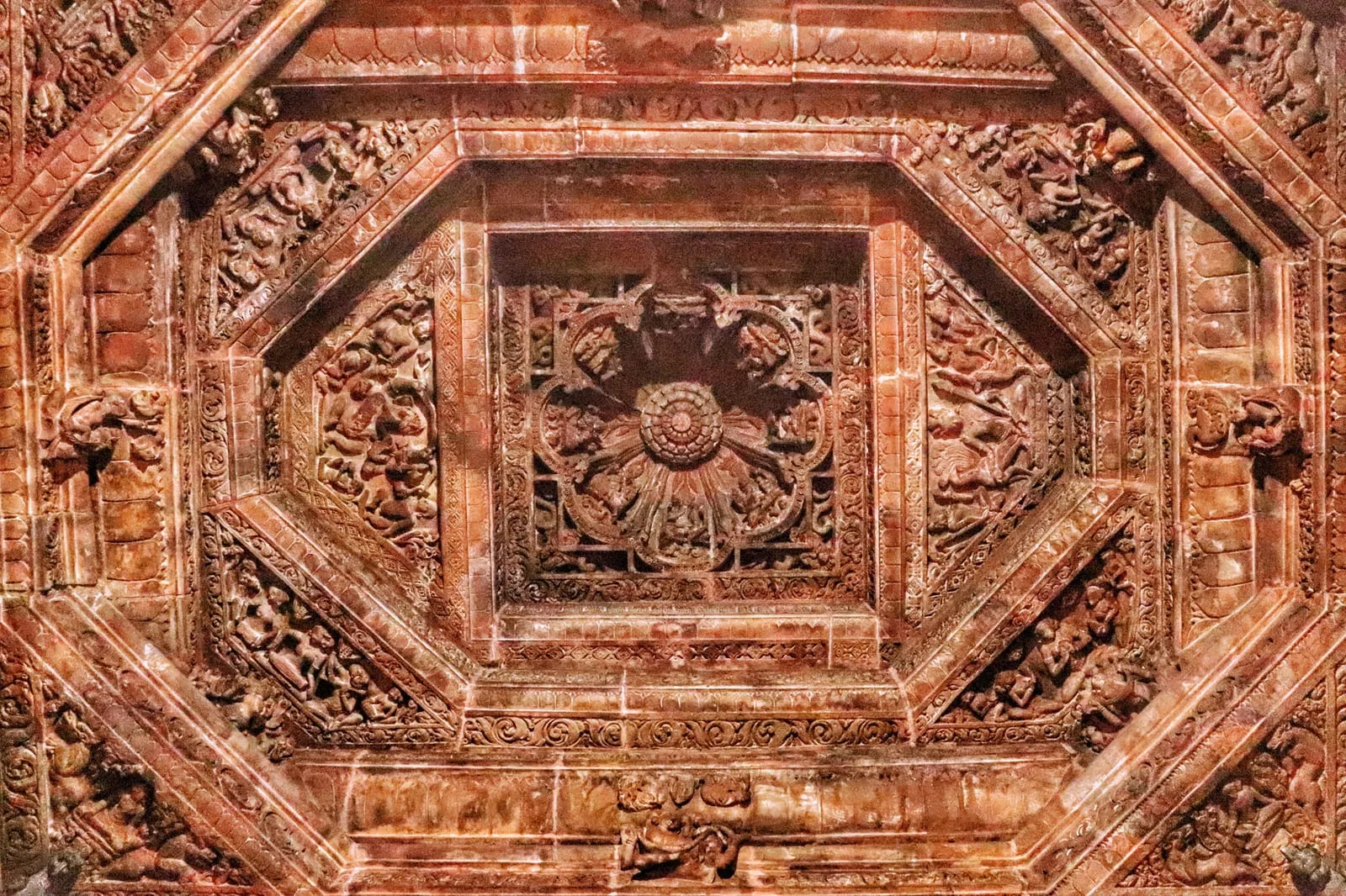 A carved ceiling medallion inside the temple